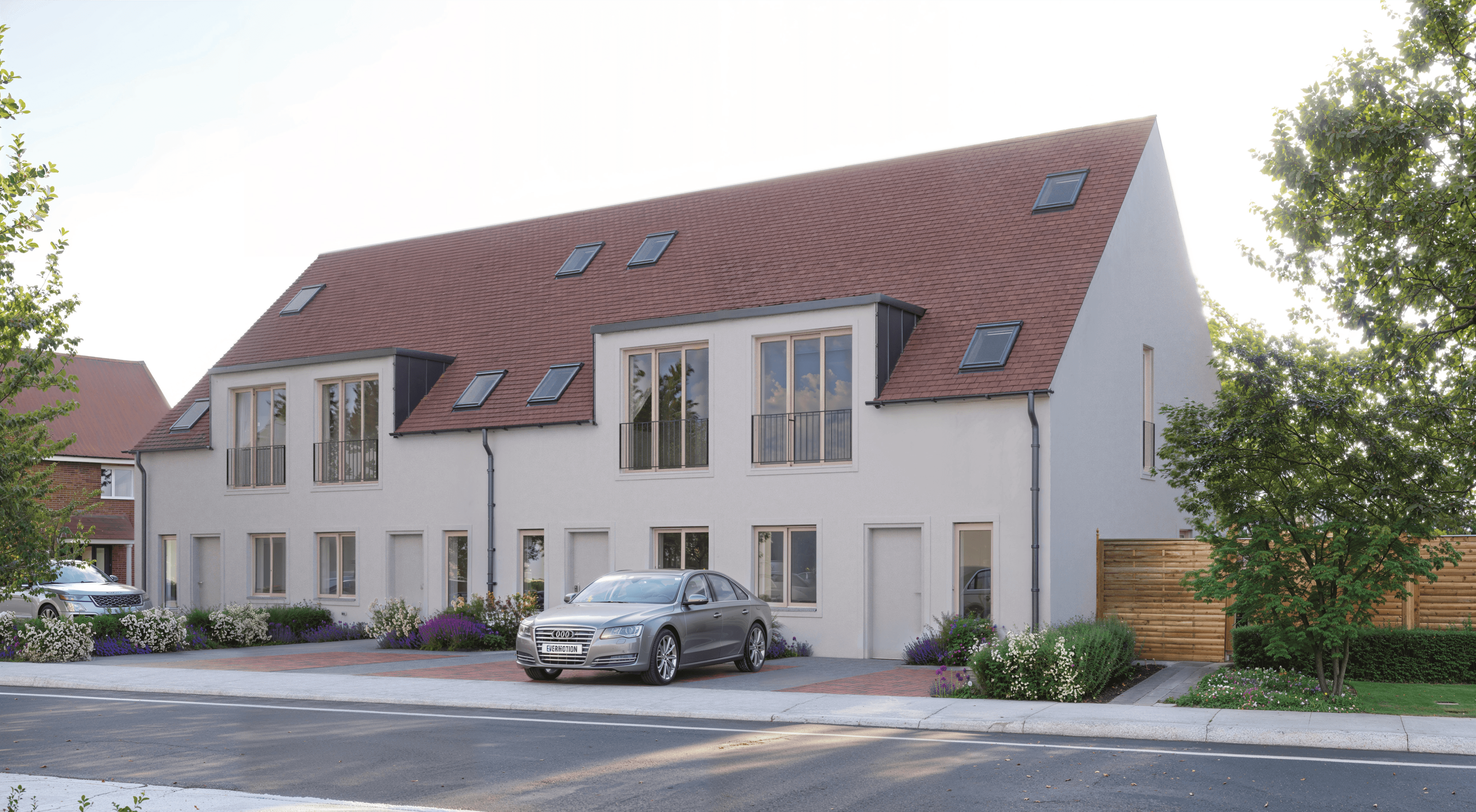 Four contemporary timber-clad homes viewed from the street approach with landscaped frontage